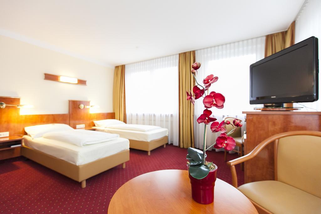 Hotel Am Berliner Platz Langenfeld  Rum bild